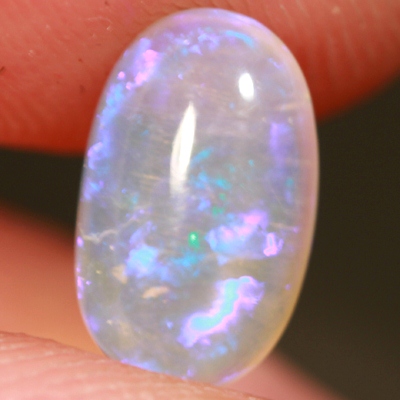 SOLID CRYSTAL OPAL Transparent with rich purple throughout